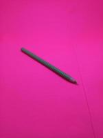 isolated pencil with pink color background photo