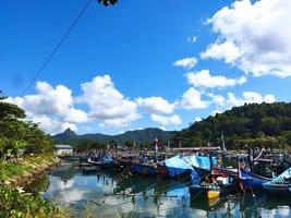 Blue sky and clouds with sailling boats photo