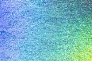 An iridescent holographic foil background pastel colors photo