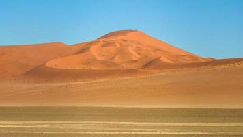 Colourful sand dunes of Namib desert photo