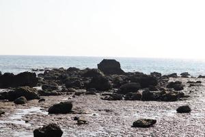 Rock Beach in Island captured during day time photo