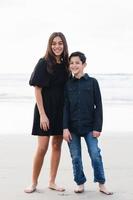 Siblings on the beach photo