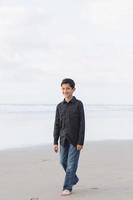 Siblings on the beach photo