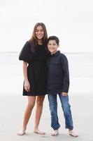 Siblings on the beach photo