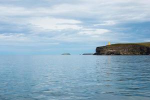 Beautiful coastal landscape from a boat. Iceland photo