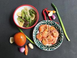 salad with corn and shrimps in bowl, top view, copy space photo