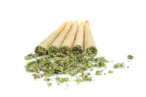 Marijuana joint pre-rolled cone paper on white background,  roll paper cannabis photo