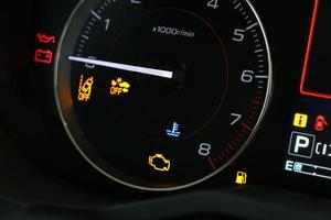 warning light engine in car dashboard photo