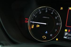 warning light engine in car dashboard photo