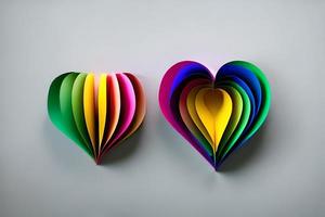 Two rainbow colored paper cut out in the love heart shape. Paper art rainbow heart background with 3d effect, heart shape in vibrant colors, vector illustration. photo