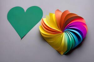 Two rainbow colored paper cut out in the love heart shape. Paper art rainbow heart background with 3d effect, heart shape in vibrant colors, vector illustration. photo