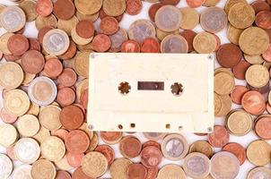 Cassette and coins photo