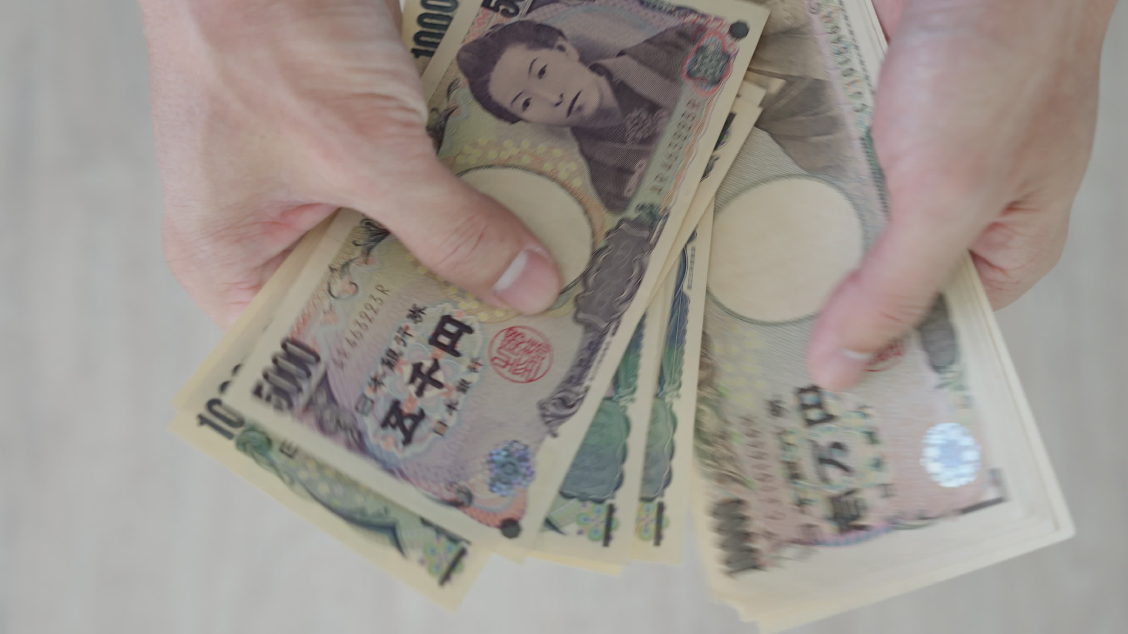 Japanese Yen money. close up of the Japanese yen on hand. currency of