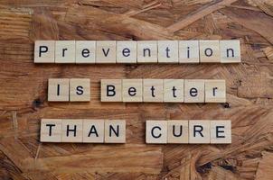 prevention is better than cure text on wooden square, health quotes photo