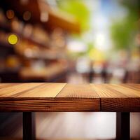 Wooden table top in cafe blurred bokeh background - image photo