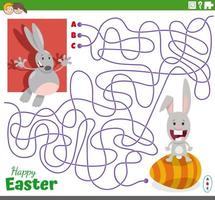 maze game with cartoon Easter Bunnies and egg vector