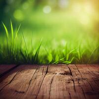 Wood table top close up, beautiful texture of green meadow grass, abstract blur natural bokeh - image photo