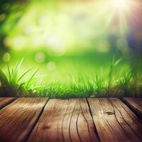 Wood table top close up, beautiful texture of green meadow grass, abstract blur natural bokeh - image photo