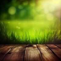 Wood table top close up, beautiful texture of green meadow grass, abstract blur natural bokeh - image photo