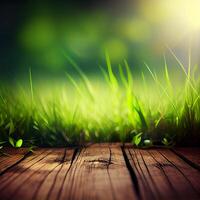 Wood table top close up, beautiful texture of green meadow grass, abstract blur natural bokeh - image photo