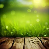 Wood table top close up, beautiful texture of green meadow grass, abstract blur natural bokeh - image photo