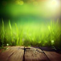 Wood table top close up, beautiful texture of green meadow grass, abstract blur natural bokeh - image photo