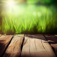 Wood table top close up, beautiful texture of green meadow grass, abstract blur natural bokeh - image photo