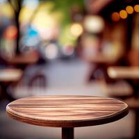 Wooden table top in cafe blurred bokeh background - image photo