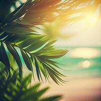 Blur beautiful nature green palm leaf on tropical beach with bokeh sun light flare wave abstract background. Summer vacation and business travel concept space - image photo