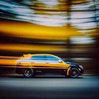 Car racing at high speed, blurred background - AI generated image photo