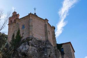 Romanesque stone monastery on the top of the mountain in the city of Soria in Spain photo