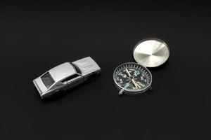 Concept for traveling. Need a guidance like compass or other navigation for traveling. A photo of a toy car and a compass, after some edits.