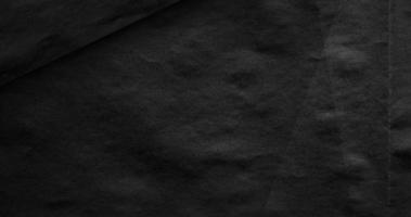 Black paper texture background, motion footage video