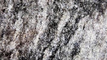 Close up of granite texture for background. Black and white tone. photo