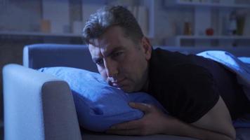 Sleeping disorder. The man who can't sleep at night. Sleep problem. video