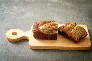 banana cake on wood board photo