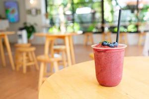 mixed berry smoothies in glass photo