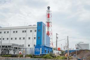 Admin building on the power plant area. The photo is suitable to use for industry background photography, power plant poster and electricity content media.