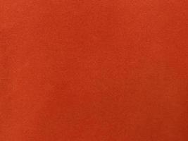 Orange velvet fabric texture used as background. Empty Orange fabric background of soft and smooth textile material. There is space for text. photo