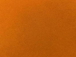Orange velvet fabric texture used as background. Empty Orange fabric background of soft and smooth textile material. There is space for text. photo