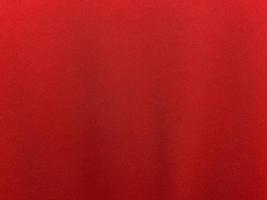 Dark red velvet fabric texture used as background. Empty dark red fabric background of soft and smooth textile material. There is space for text. photo