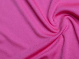 Pink velvet fabric texture used as background. Empty pink fabric background of soft and smooth textile material. There is space for text. photo