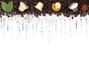 Dark roasted coffee beans setup on white background with copy space. photo