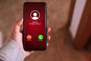 Smartphone incoming unwanted call. Spam, scam, phishing and fraud concept. Security technology. photo