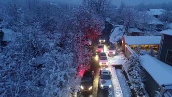 elegant wedding cortege of cars in the snowy evening video