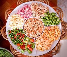 Set of herbs and spices and vegetable slice on tray for ingredients taste savory cook spicy food of asia photo