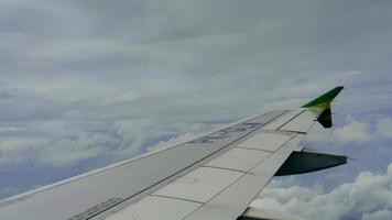 Clouds and sky view through window of aircraft video