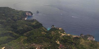 View from the window airplane flight above clouds and sea with tropical islands video