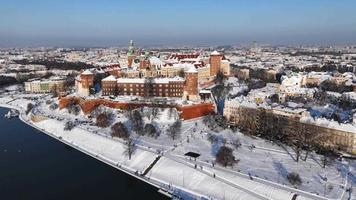 Aerial hyperlapse of Wawel Royal Castle covered with snow, Krakow video