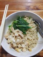 Chicken noodles with dumpling soup that is already cooked looks very delicious and tempting. photo